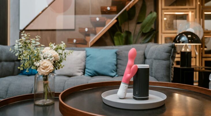 a couple of toothbrushes sitting on top of a table